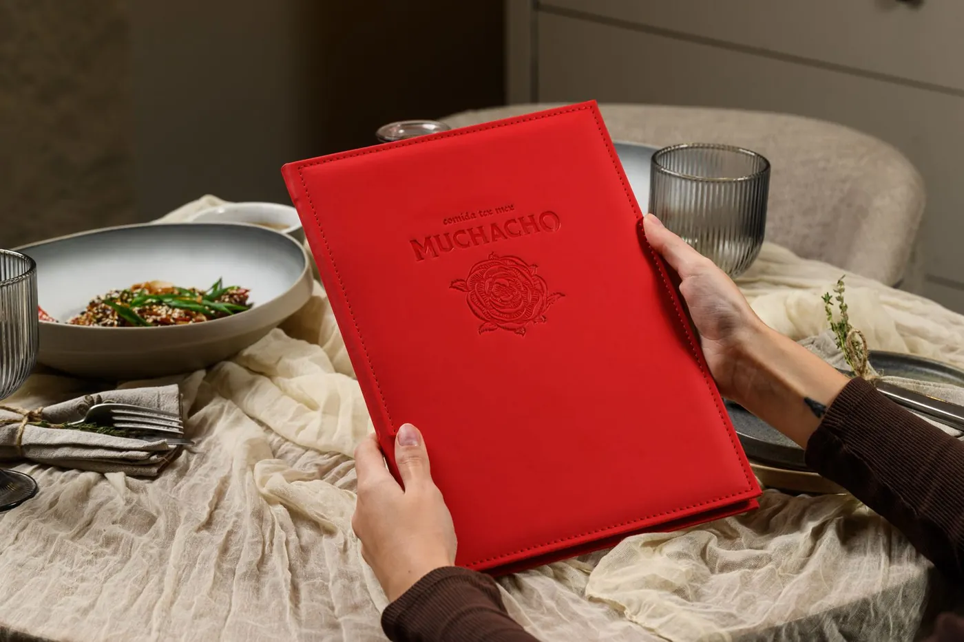 Red leather menu cover, embossed logo