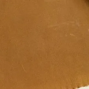 Ochre leather sample, close-up